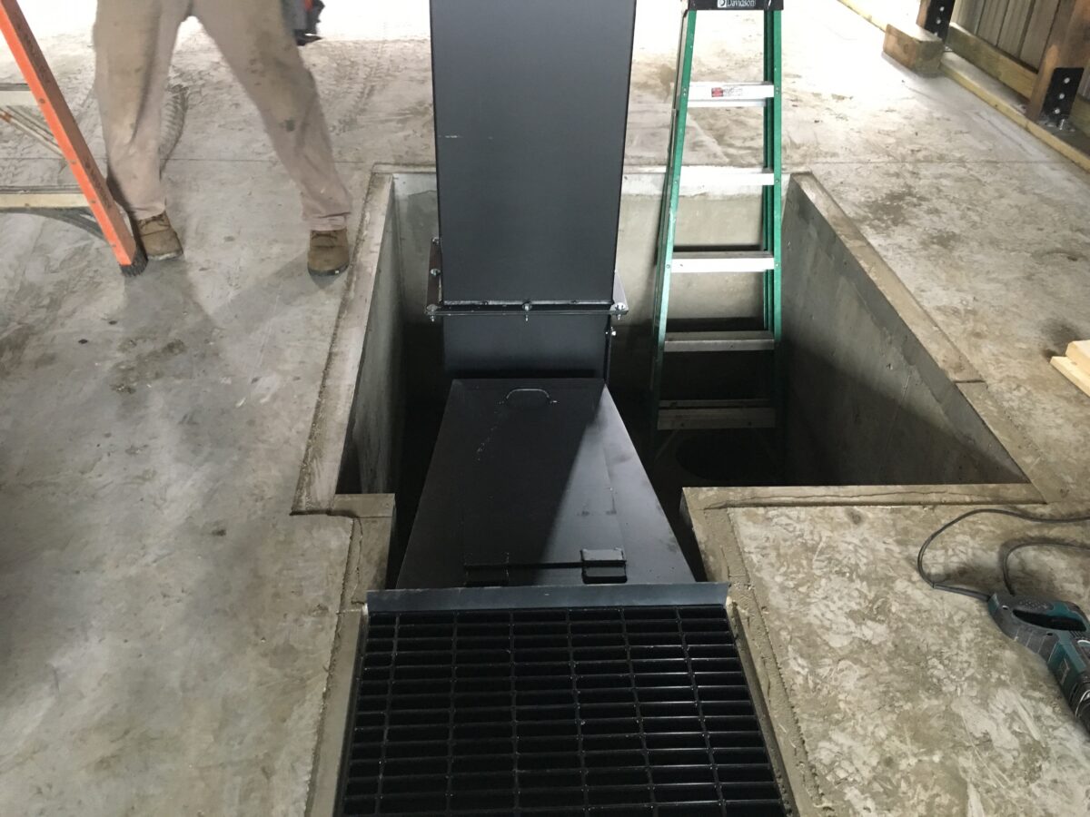 A recessed media reclaim hopper.