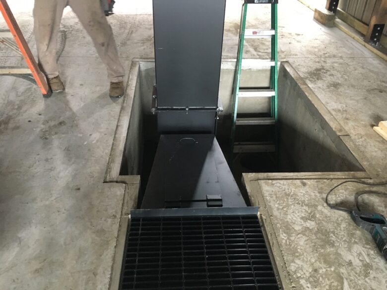 A recessed media reclaim hopper.